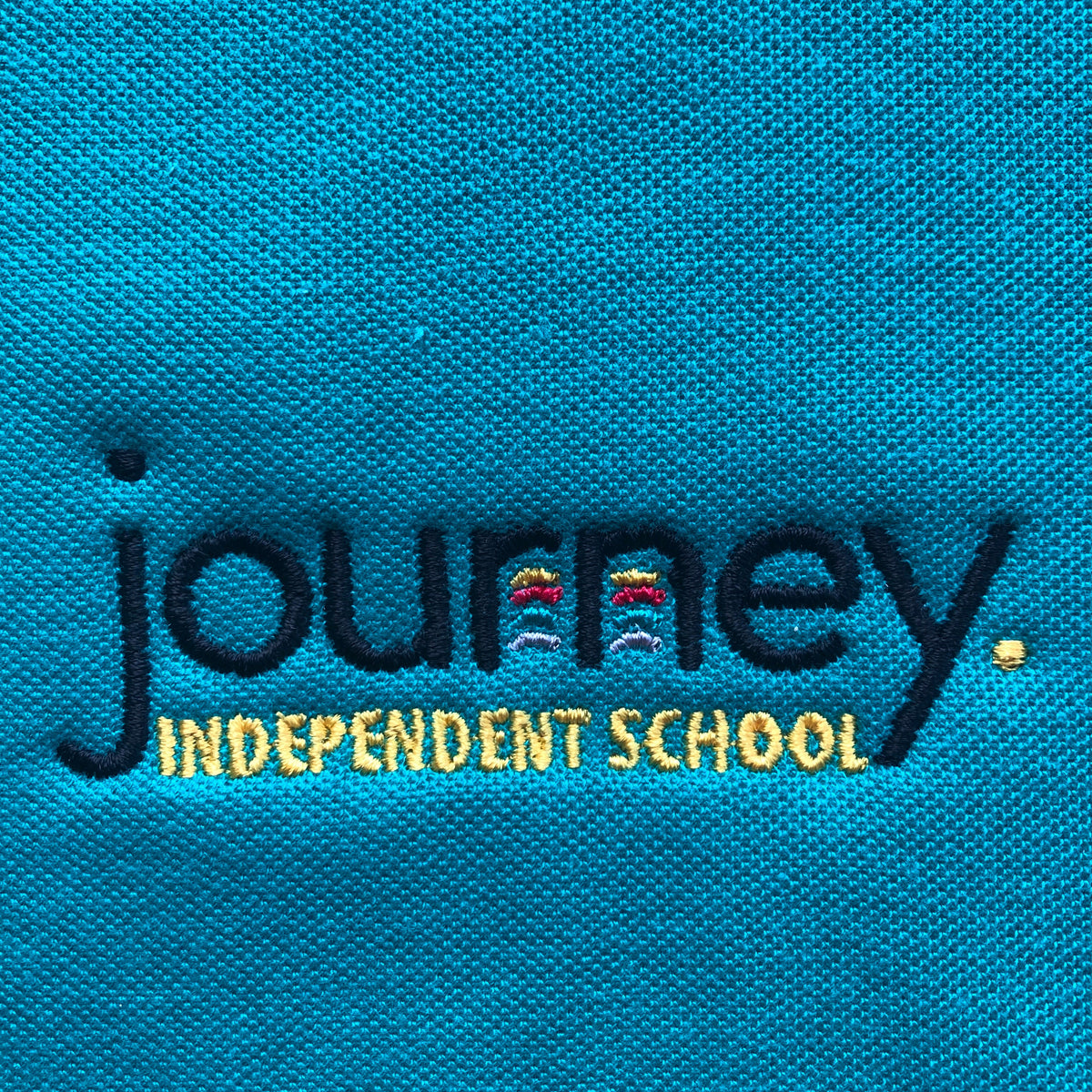 Journey Independent School polo shirt