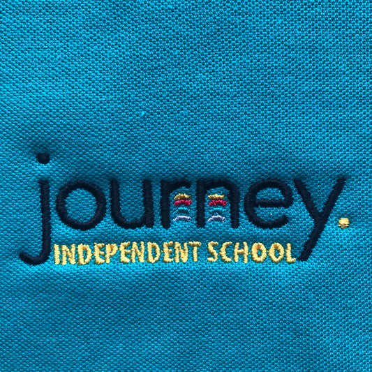 Journey Independent School polo shirt
